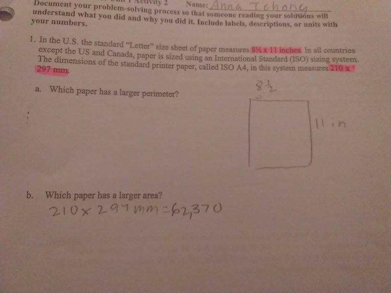 Which paper has a larger perimeter?​-example-1