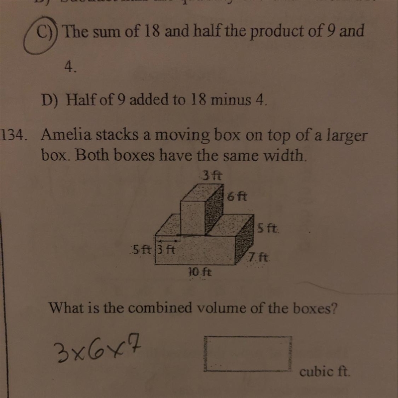 Amelia stacks a moving box on top of a larger box. Both boxes have the same width-example-1