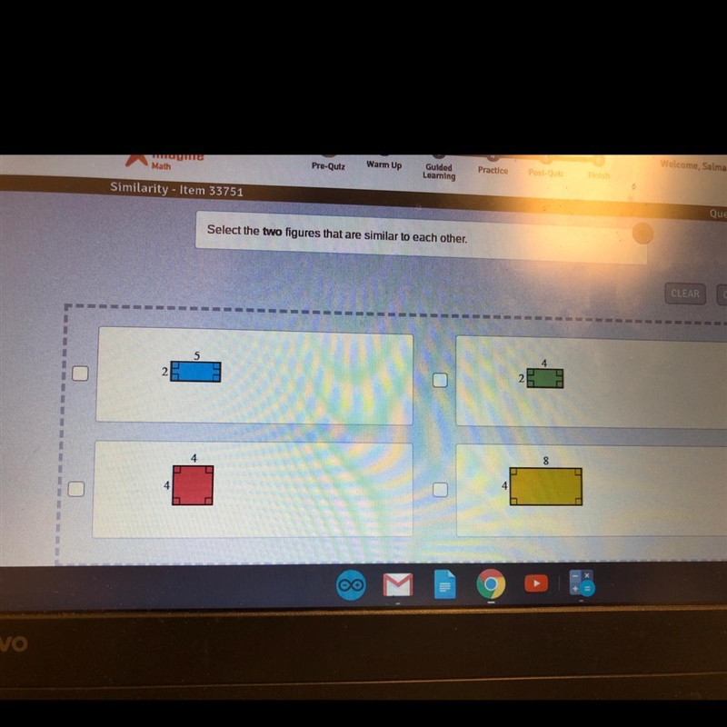 Select the two figures that are similar to each other.-example-1