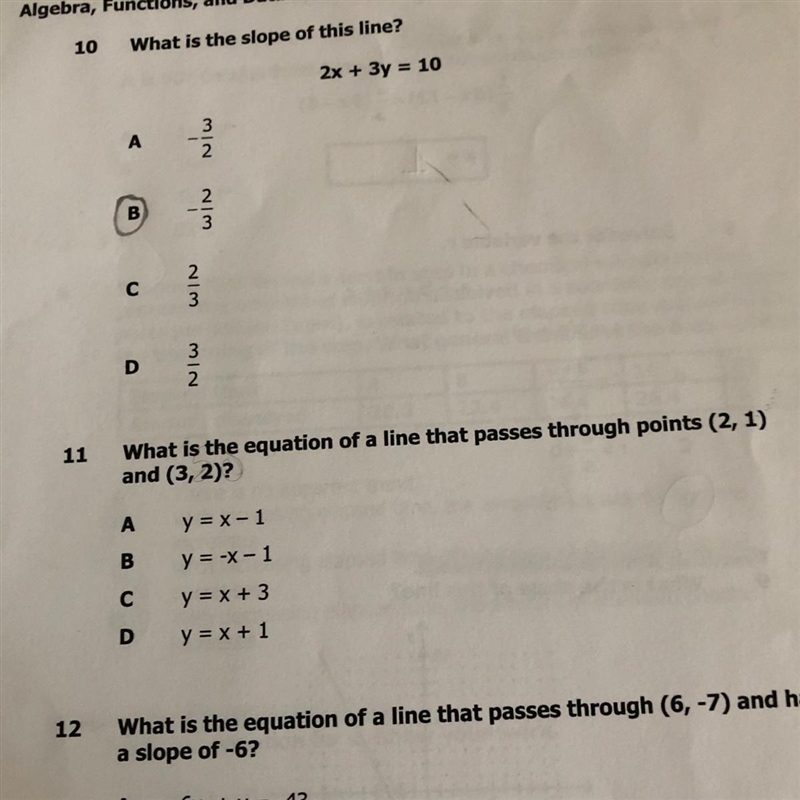 What is the equation of a line that passes through points (2, 1) and (3, 2)?-example-1