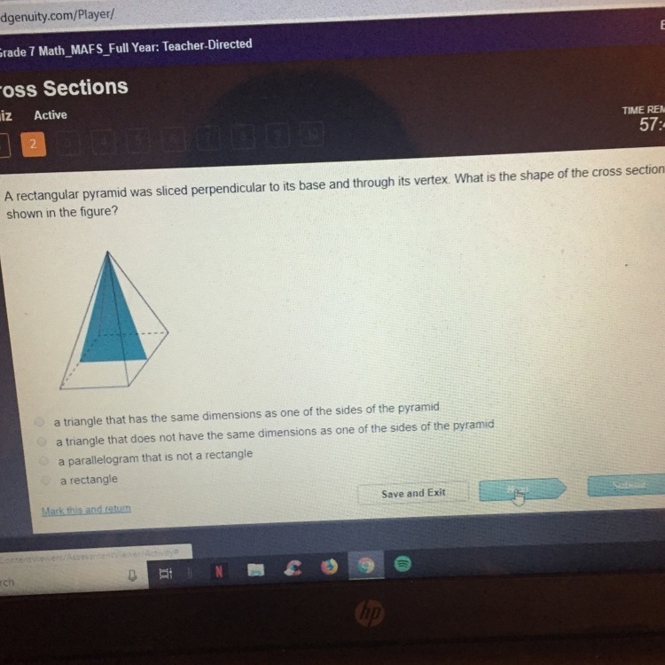 a rectangular pyramid was sliced perpendicular to its base and through its vertex-example-1