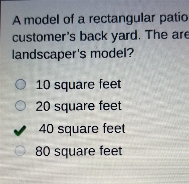 A model of a rectangular patio at a landscaping business will be enlarged by a scale-example-1