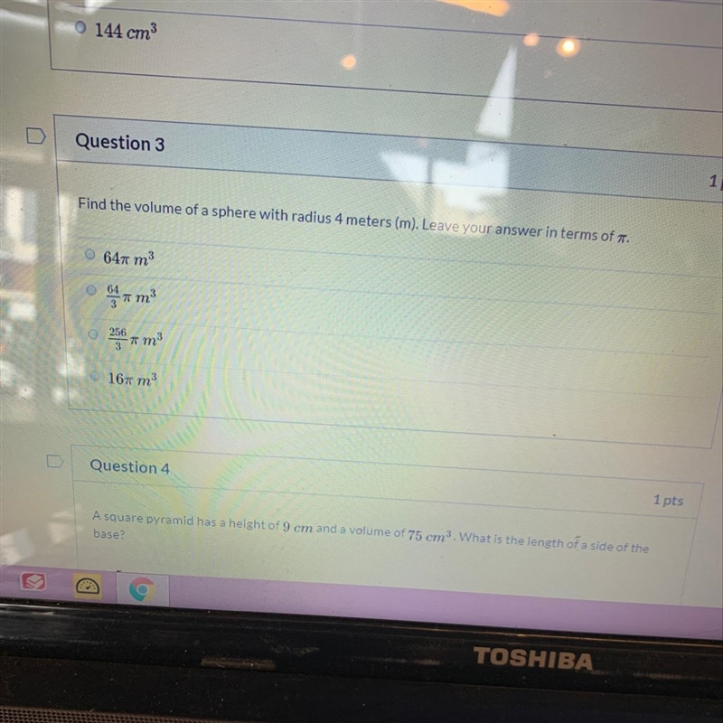 Find the volume of a sphere with a radius of 4 m. Leave your answer in the form of-example-1