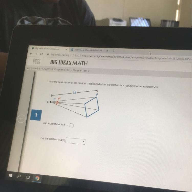 Find the scale factor of the dilation. Then tell whether the dilation is a reduction-example-1