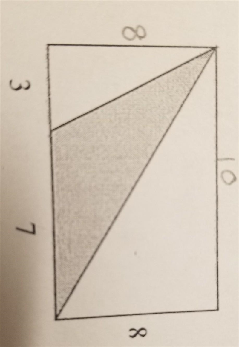 The shaded triangle at right is surrounded by a rectangle. Find the area of the triangle-example-1