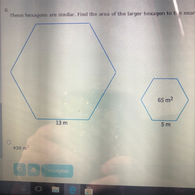 These hexagons are similar. Find the area of the larger hexagon to the nearest whole-example-1