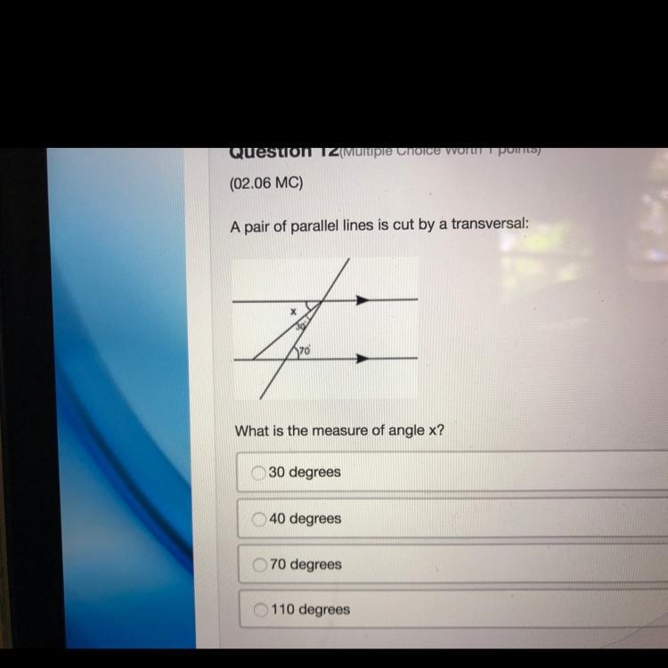 A pair of parallel lines is cut by a transversal: What is the measure of angle x?-example-1