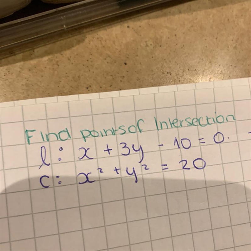 Find the point of intersection between the line and circle-example-1