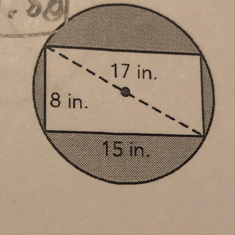 Calculate the area of the shaded region-example-1