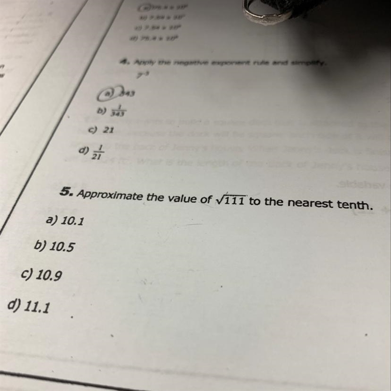 Approximate the value of 111 to the nearest tenth.-example-1