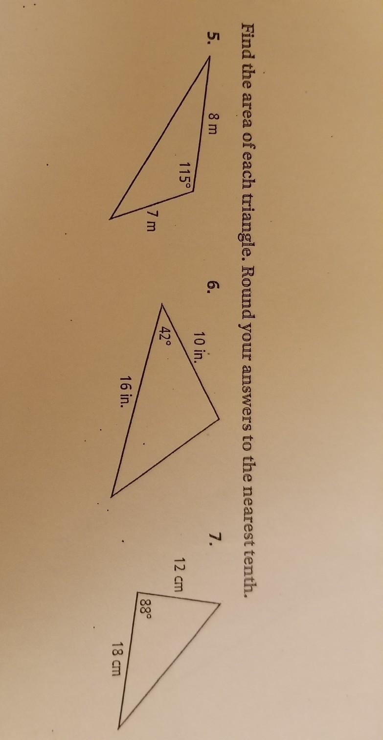 Find the area of each triangle. Round your answers to the nearest tenth​-example-1