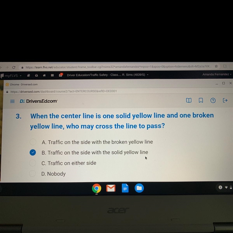 when the center line is one solid yellow line and one broken yellow line,who may cross-example-1