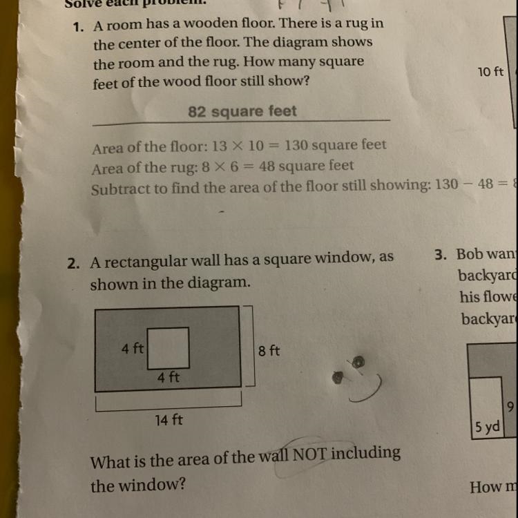 A rectangular wall has a square window as shown as in the diagram What is the area-example-1