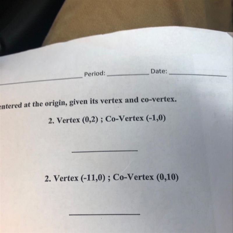 Write an equation of the ellipse centered at the origin given its vertex and co vertex-example-1