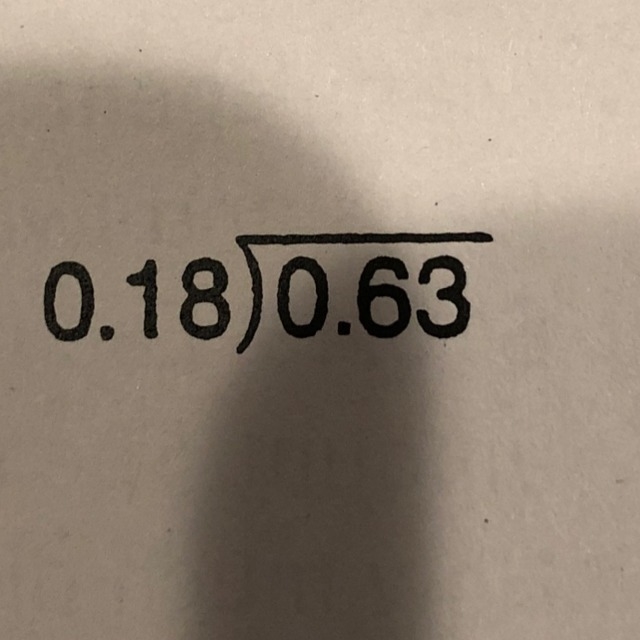 What’s 0.18 divided by 0.63?-example-1