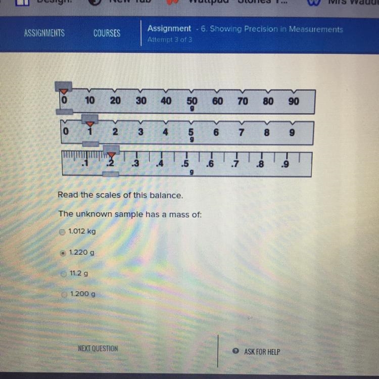 Read the scales of this balance. The unknown sample has a mass of: A.) 1.012 kg B-example-1