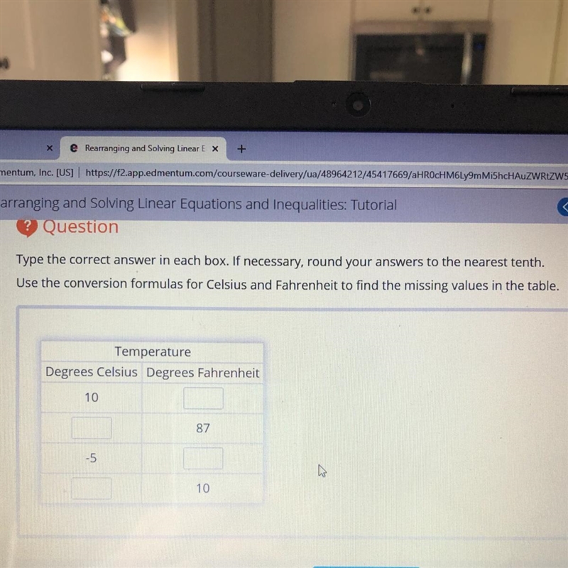 Type the correct answer in each box. If necessary, round your answers to the nearest-example-1