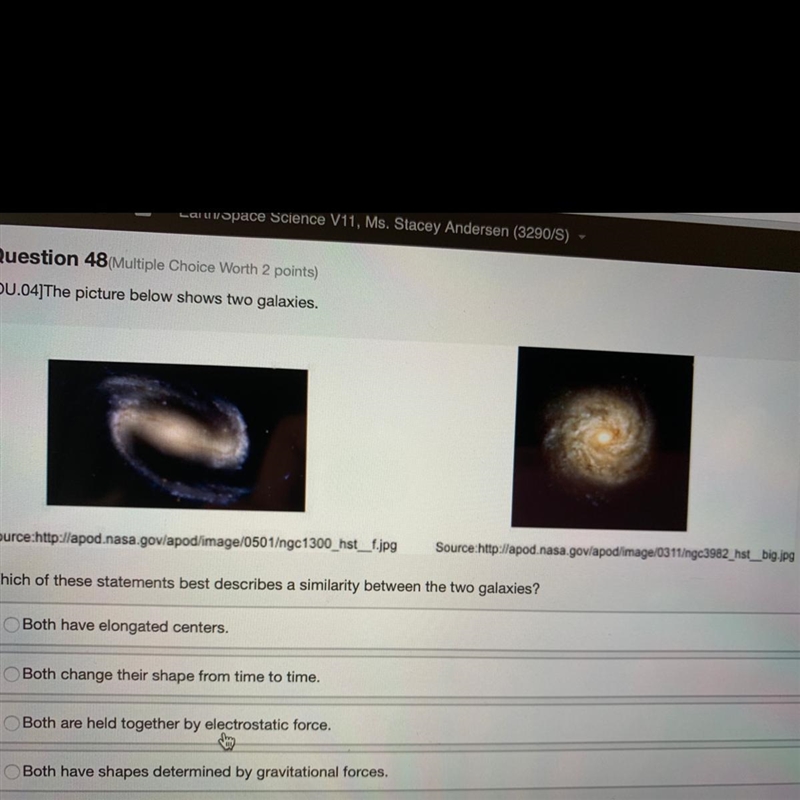 [OU.04] The picture below shows two galaxies. What of these statements best describes-example-1