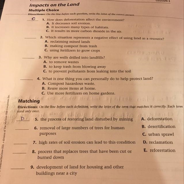 Which situation represents a negative effect of using land as a resource?-example-1