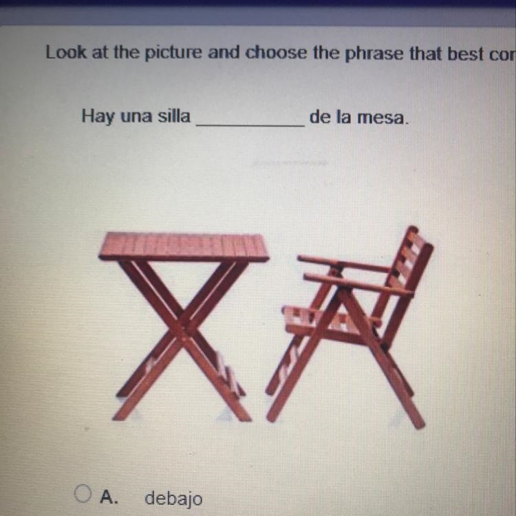 Hay ima silla ________ de la Mesa. A. Debajo B. a la derecha C. Encima D. Detras-example-1