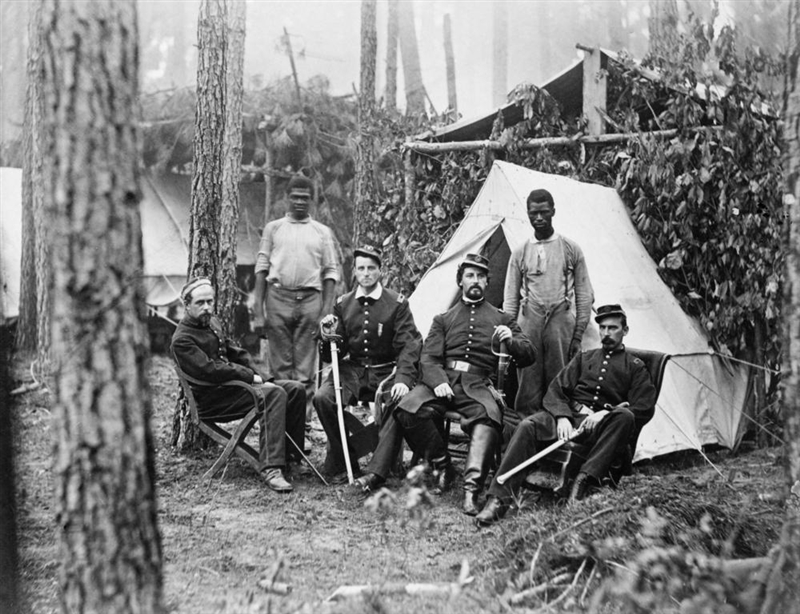 Check out this photograph of Northern officers in 1863. What does this picture tell-example-1