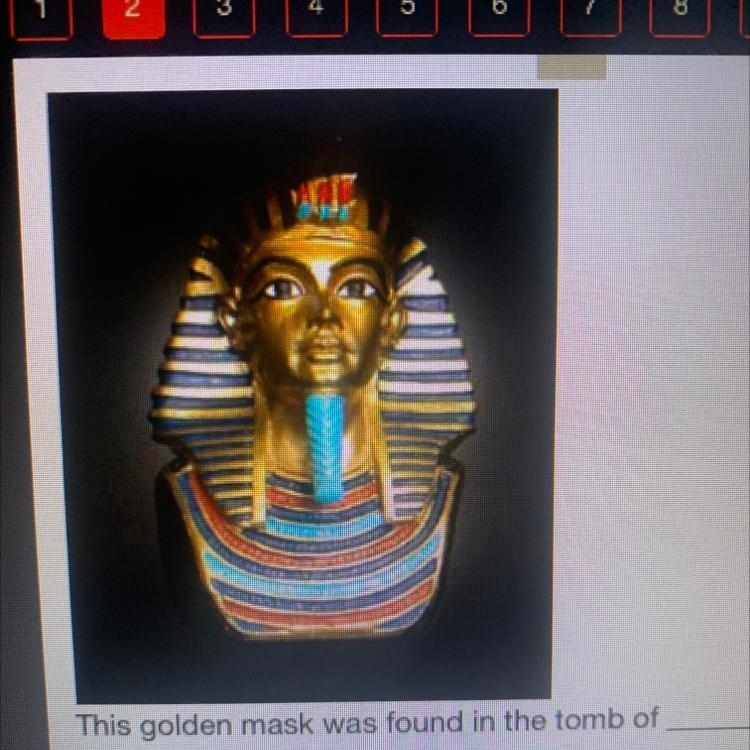 This golden mask was found in the tomb of ...... and it provided new information to-example-1