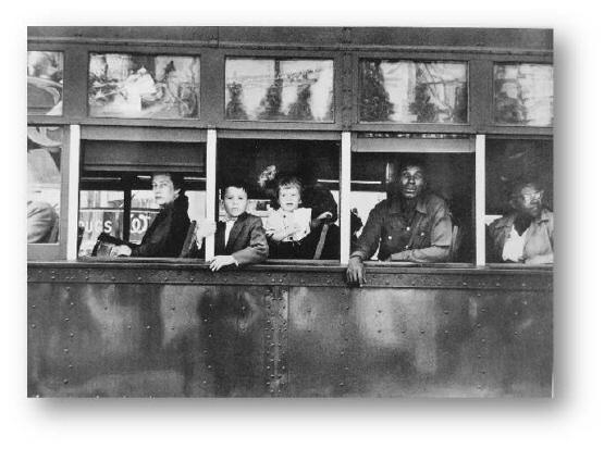 Trolley–New Orleans by Robert Frank. People in a trolley look out of the windows at-example-1