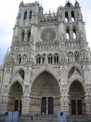 The Notre Dame Cathedral in Paris, France. The cathedral is smaller in height but-example-2