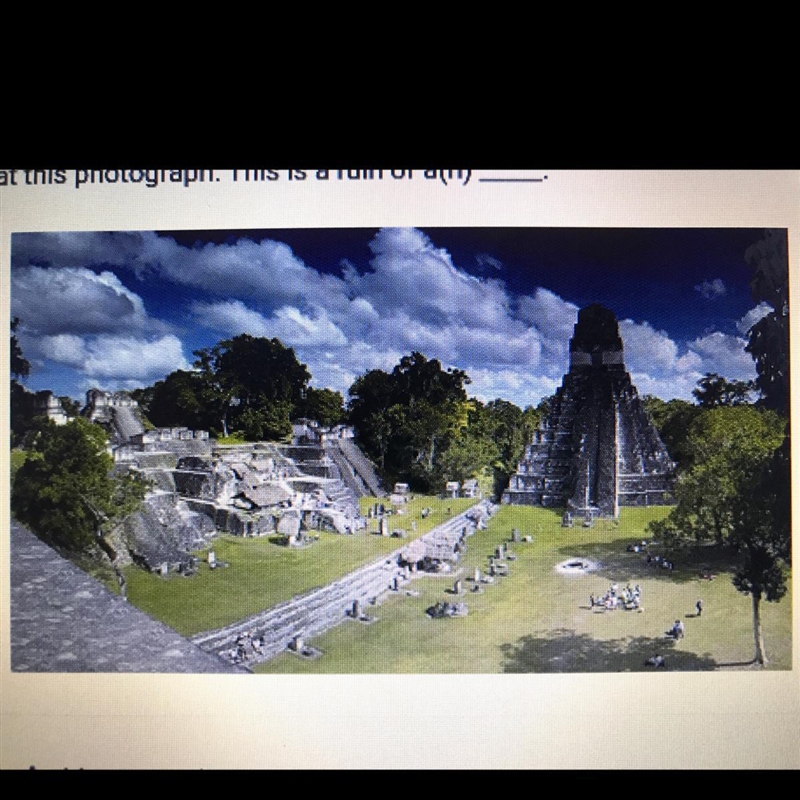 Look at this photograph. This is a ruin of a(n) A. Maya temple B. Great Plains city-example-1