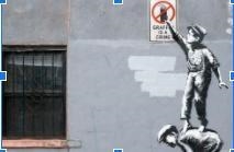 This work by Banksy is considered a non-traditional work and can be considered ___________ because-example-1