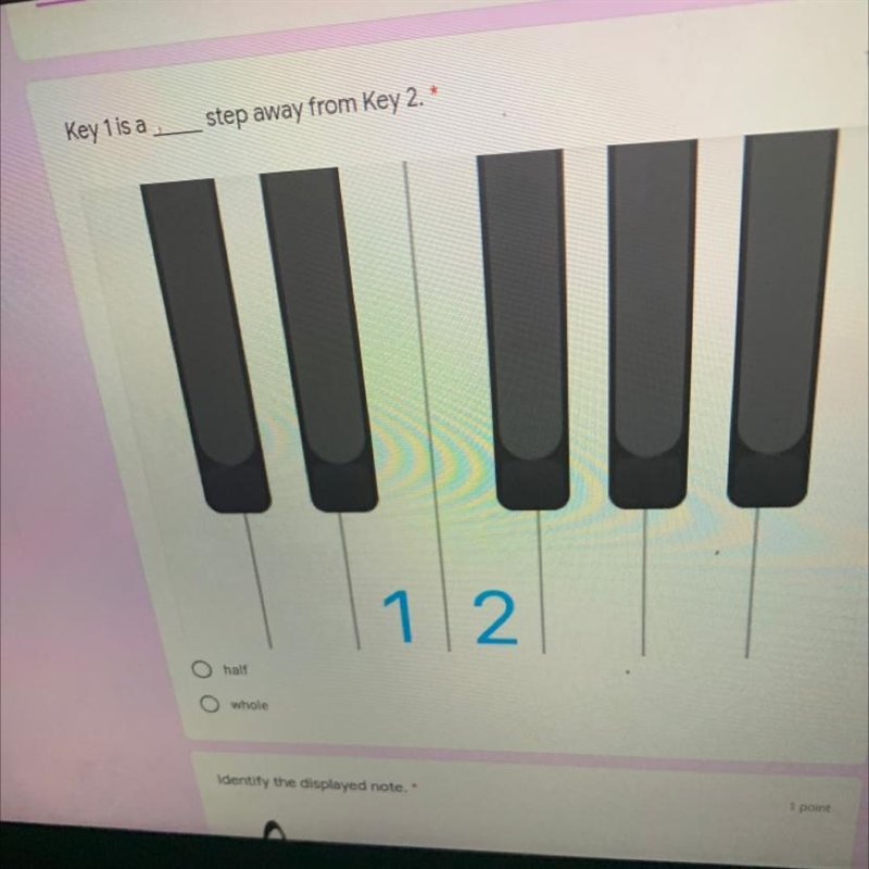 Key 1 is a ___ step away from Key 2. A. Half B. Whole-example-1