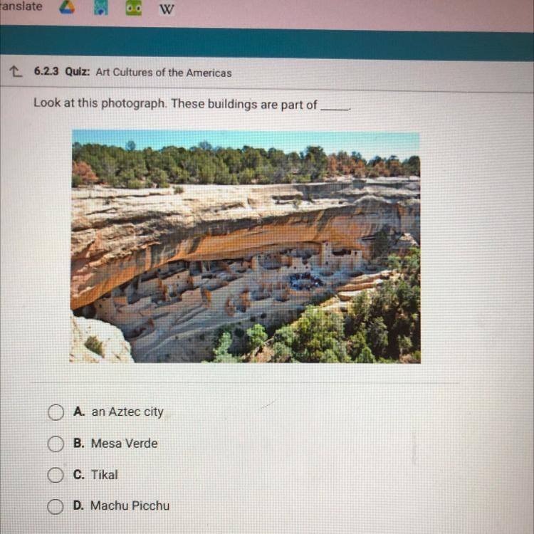 Look at this photograph. These buildings are part of A. an Aztec city B. Mesa Verde-example-1