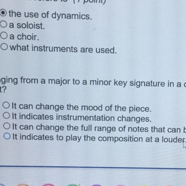 Changing for my major to a minor key signature in a composition can have what affect-example-1