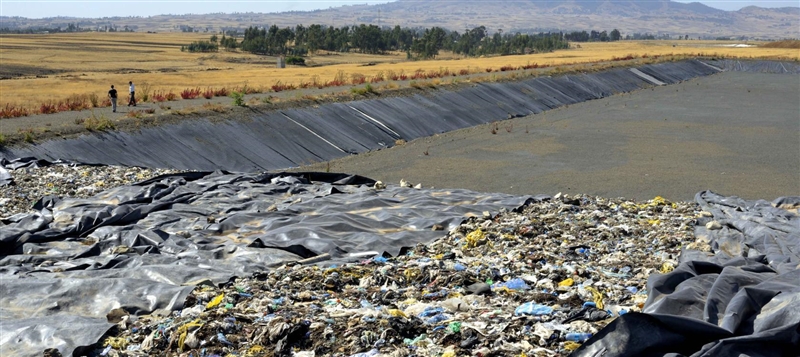 How is sanitary landfill different from open dump-example-2