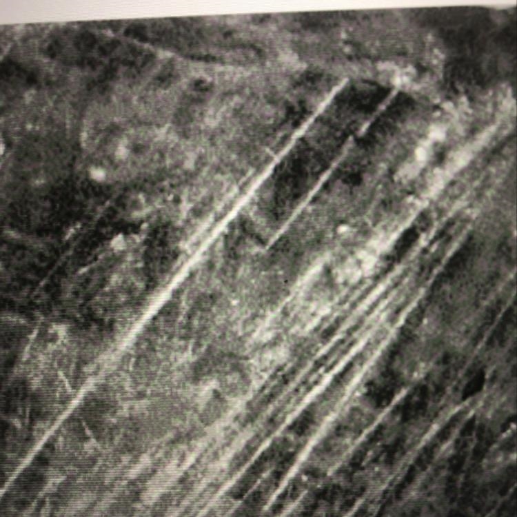 These parallel scratches were most likely caused by Ocean waves Running water Wind-example-1