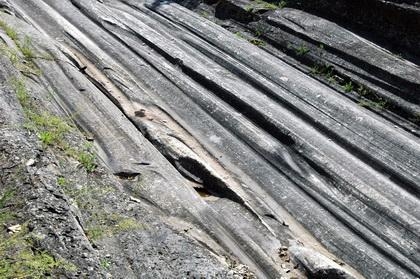 In northeastern Minnesota, the glaciers were thousands of feet thick and glacial scratches-example-1