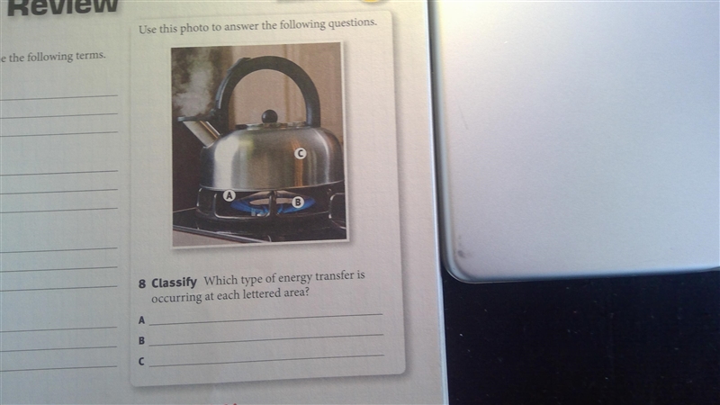 Look at the photo on page 41 of your textbook. Which type of energy transfer is occurring-example-1