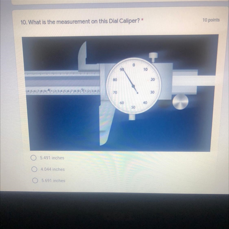 What is the measurement on this Dial Caliper? A. 5.491 B. 4.044 C. 5.691-example-1