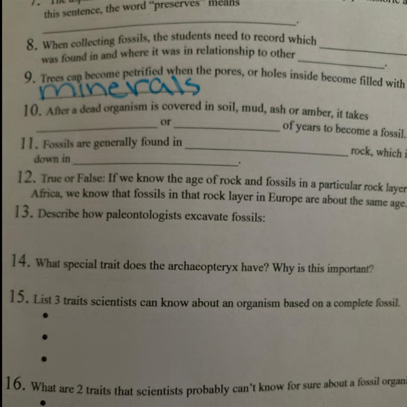 After a dead organism is covered in soil, mud, ash, or amber how long does it take-example-1