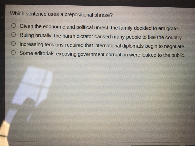 Which sentence uses a prepositional phrase?-example-1