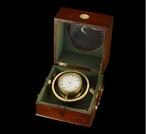 Text: It is made of brass and is around the size of a large pocket watch, with a normal-example-1