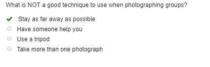 What is not a good technique to use when photographing groups? A-Stay as far away-example-1
