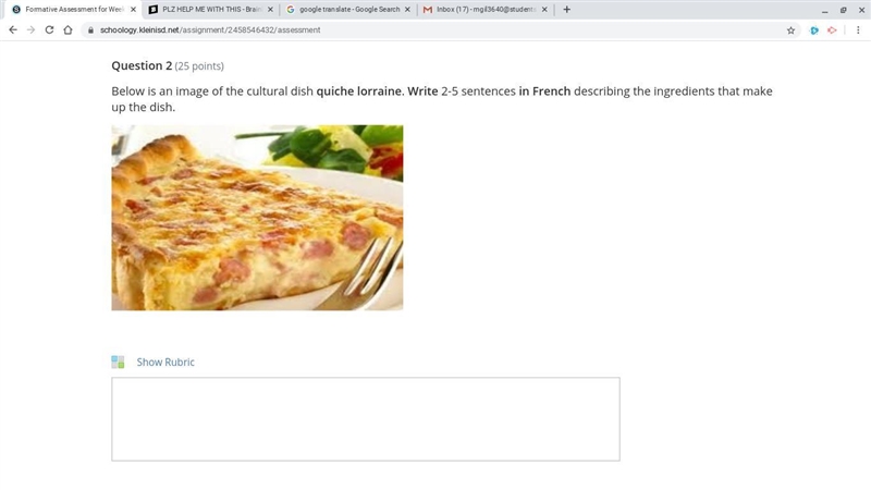 Below is an image of the cultural dish quiche lorraine. Write 2-5 sentences in French-example-1