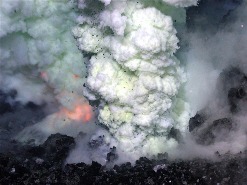 How do deep ocean volcanoes form islands? If you can please explain it in 5 steps-example-1