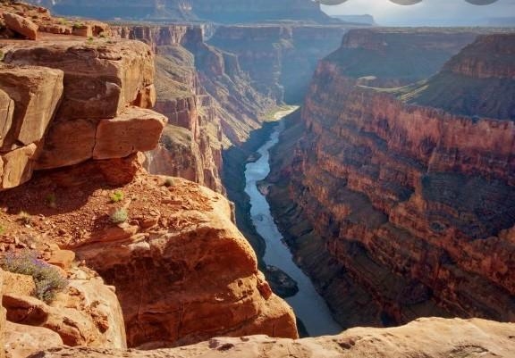 Briefly explain the current idea about how the Grand Canyon formed.-example-1