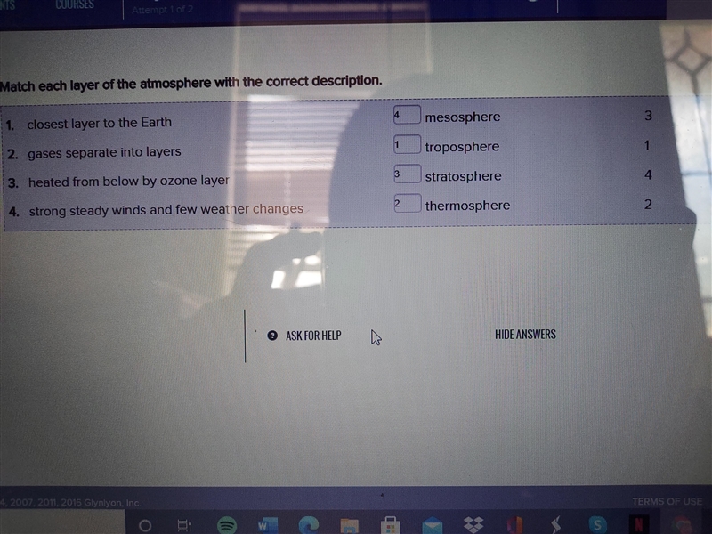 Match each layer of the atmosphere with the correct description. 1. closest layer-example-1