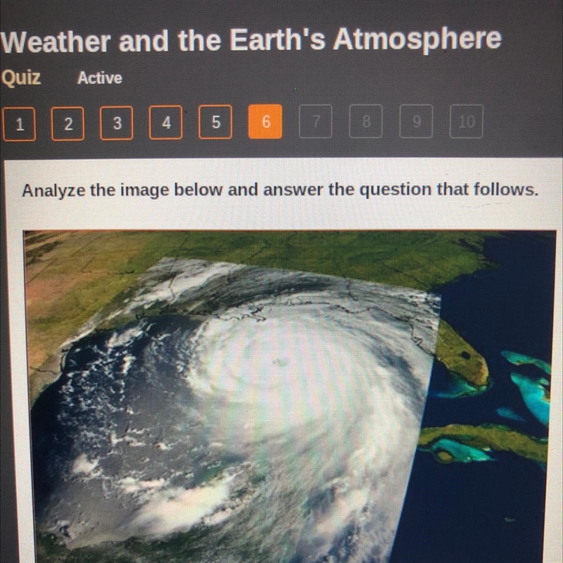 Image courte The image above, taken from a weather satellite, shows a storm that formed-example-1