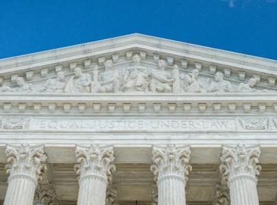 What elements from ancient Greek architecture do you see on the US Supreme Court Building-example-1