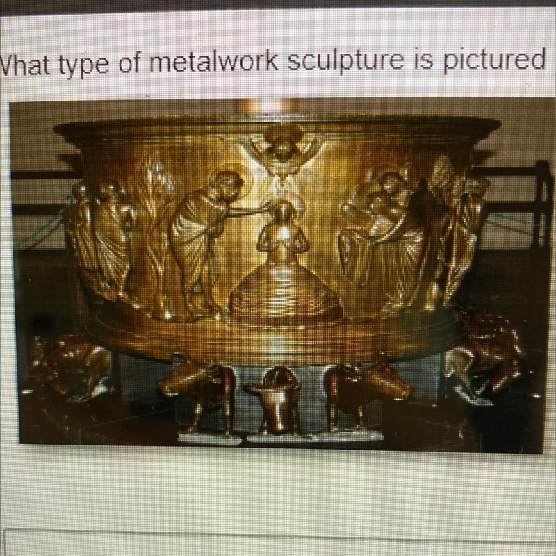 What type of metalwork sculpture is pictured below?-example-1