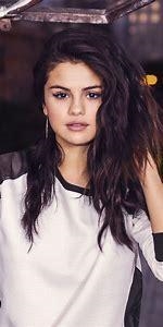 What kinda singer is selena gomez? A. American Singer B. new york singer C. californa-example-1